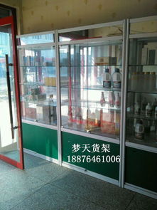 旋转展架 玻璃柜台 晋江精品展示柜 晋江钛合金货架价格 厂家 图片